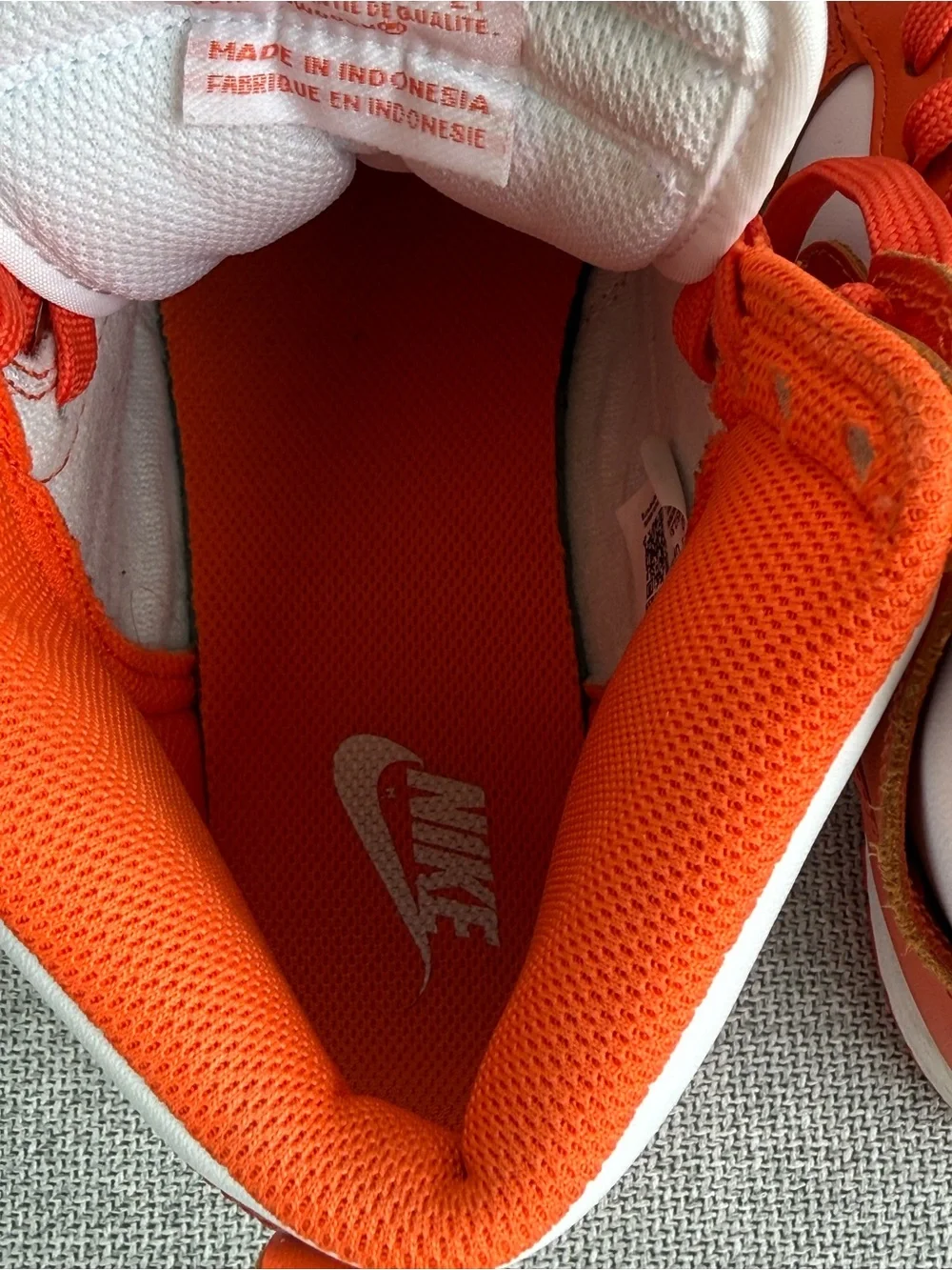 Nike High-Top Athletic Sneakers in Orange and White